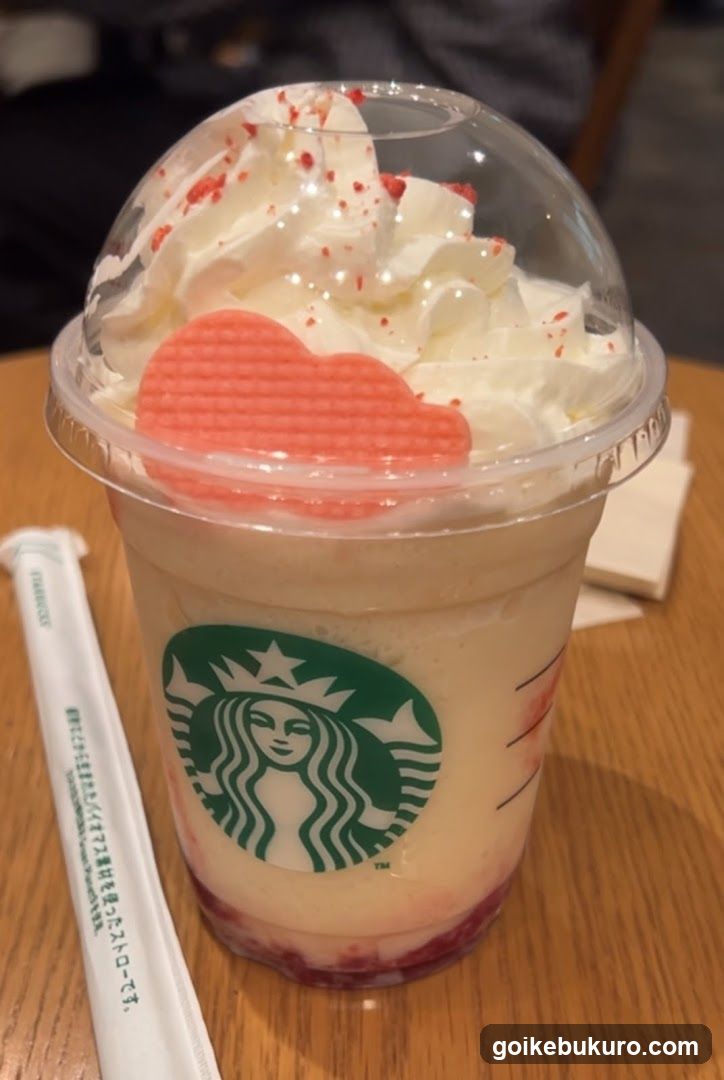 Starbucks Frappuccino with Whipped Cream and Heart Shaped Cookie