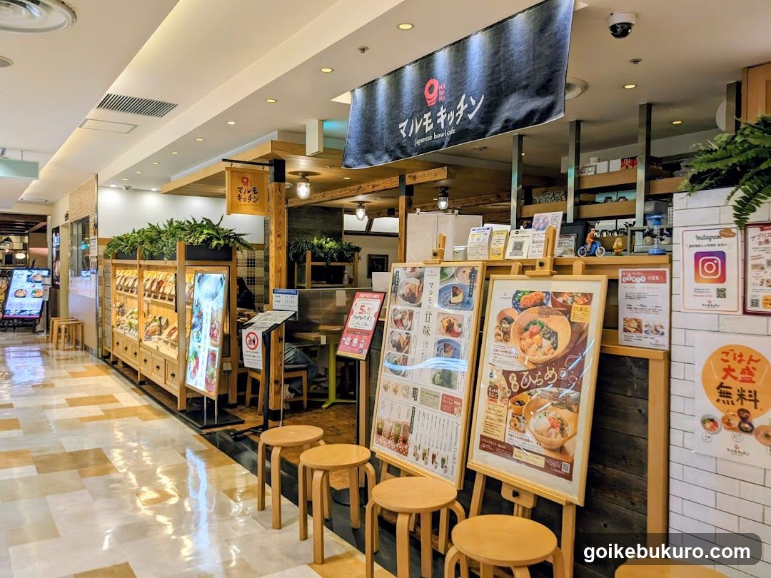 Japanese Restaurant Interior with Menu Boards and Seating Area