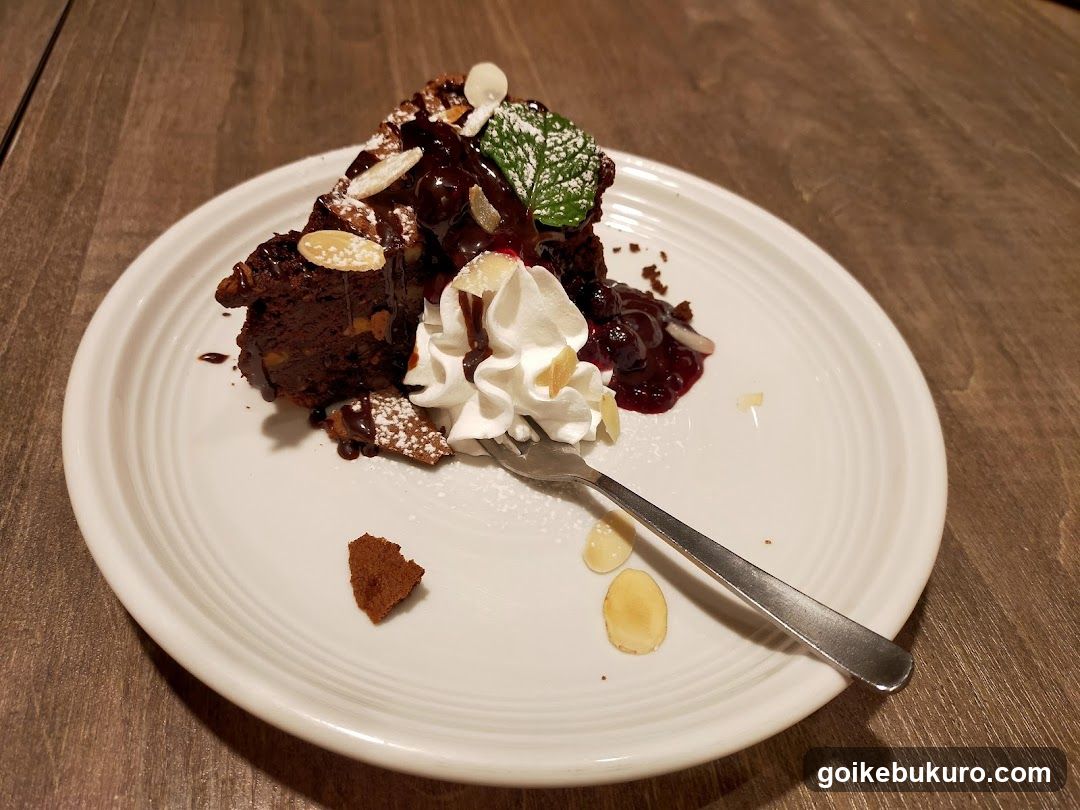 Chocolate Cake with Whipped Cream and Almonds