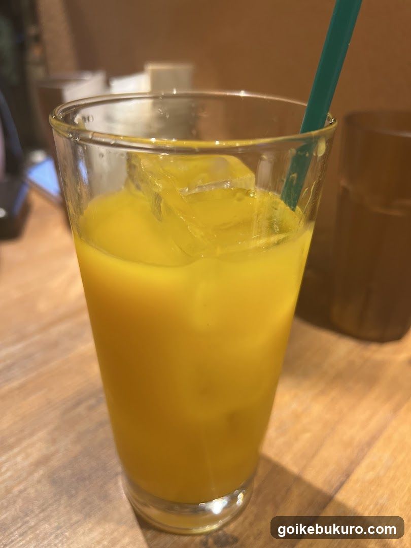 Iced Mango Juice with Straw