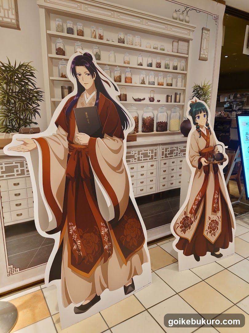 Anime Character Cutouts in Tea Shop Interior