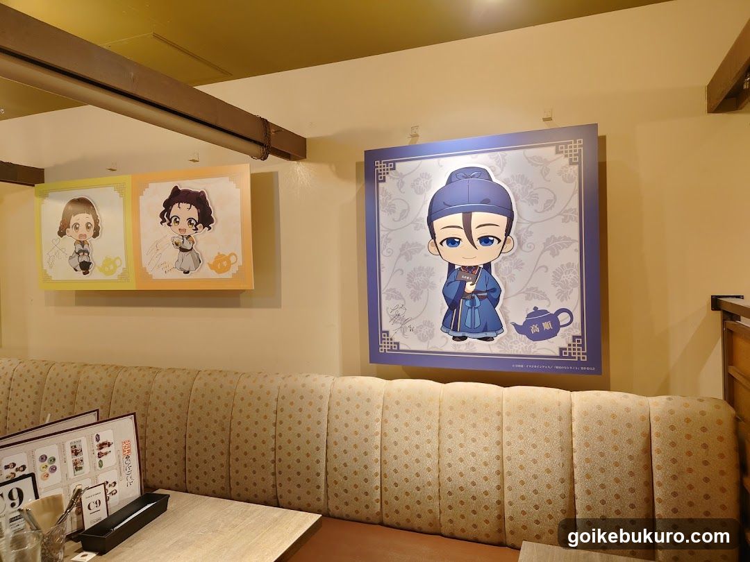 Interior of a themed restaurant with chibi character art