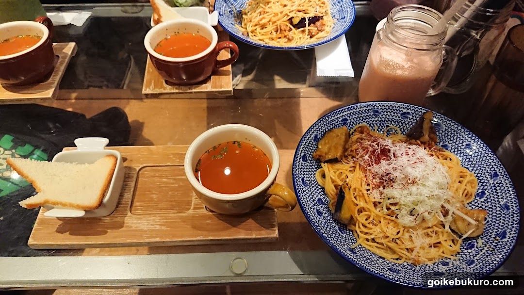 Dining Table with Pasta and Soup