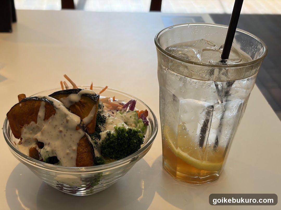 Salad Bowl with Dressing and Iced Tea