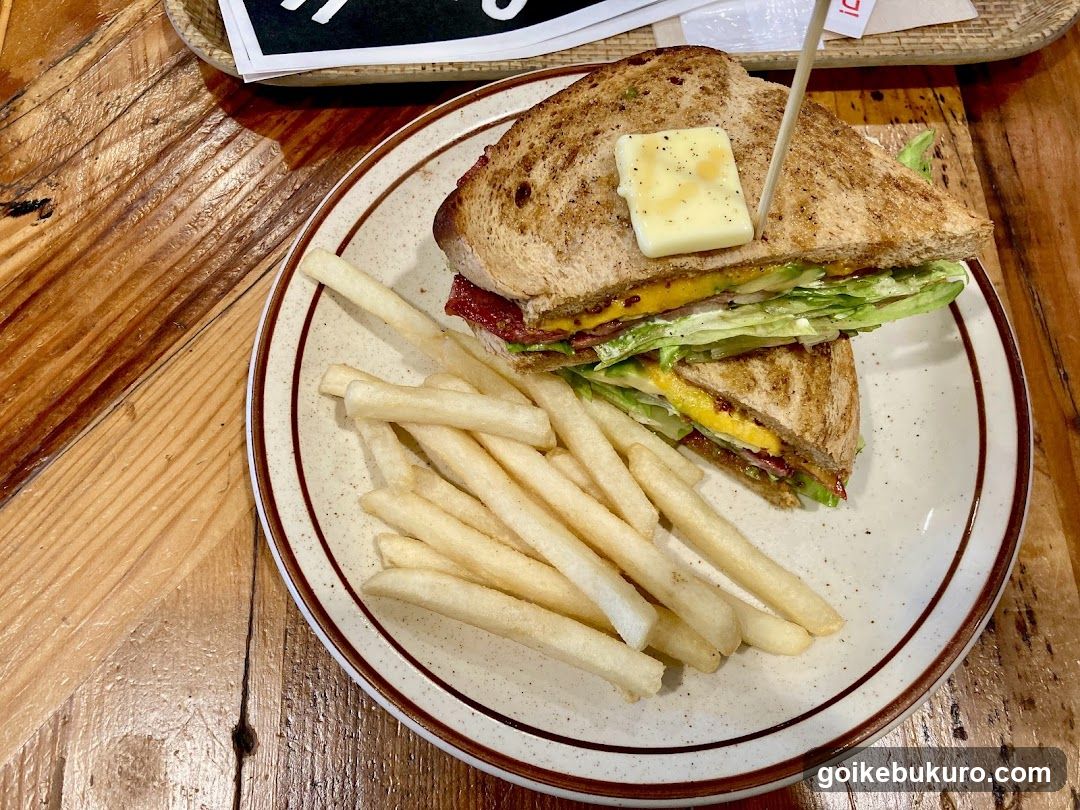 Sandwich and Fries on Wooden Table