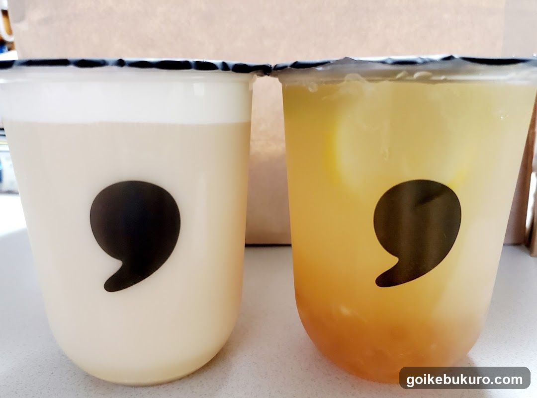 Two beverage cups with quotation mark logo