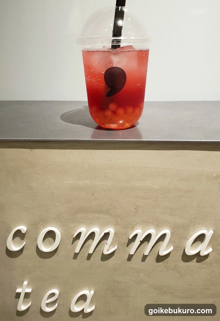 comma tea drink