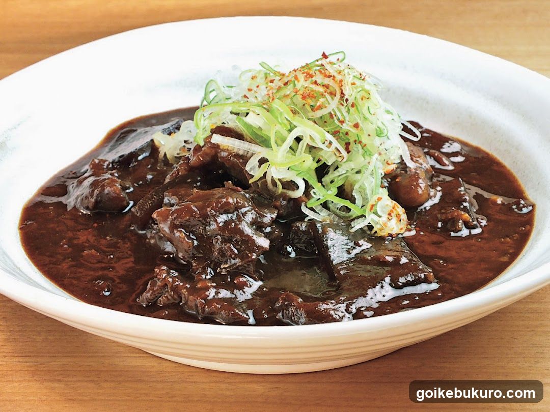 Dish with Dark Sauce and Toppings