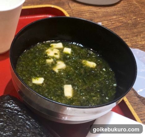 Bowl of seaweed soup with tofu cubes