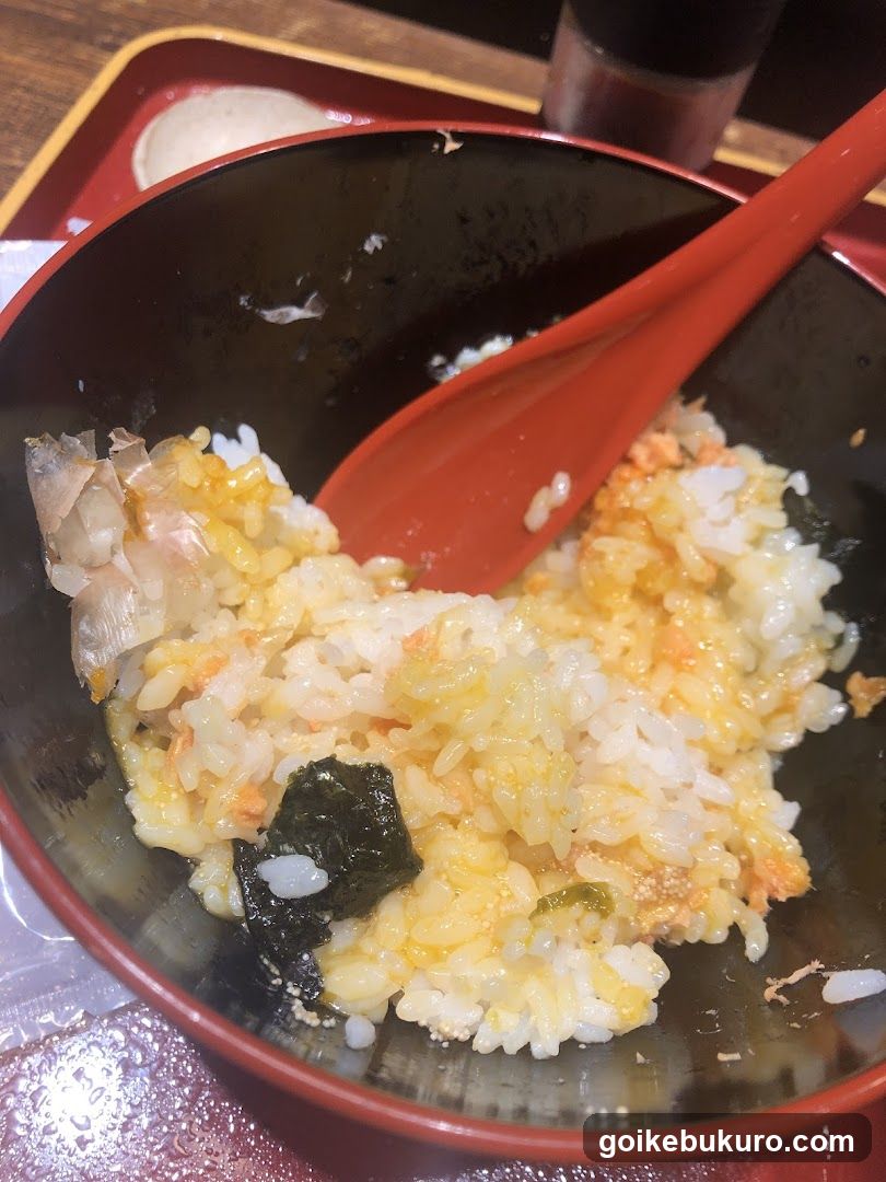 Rice Bowl with Red Spoon